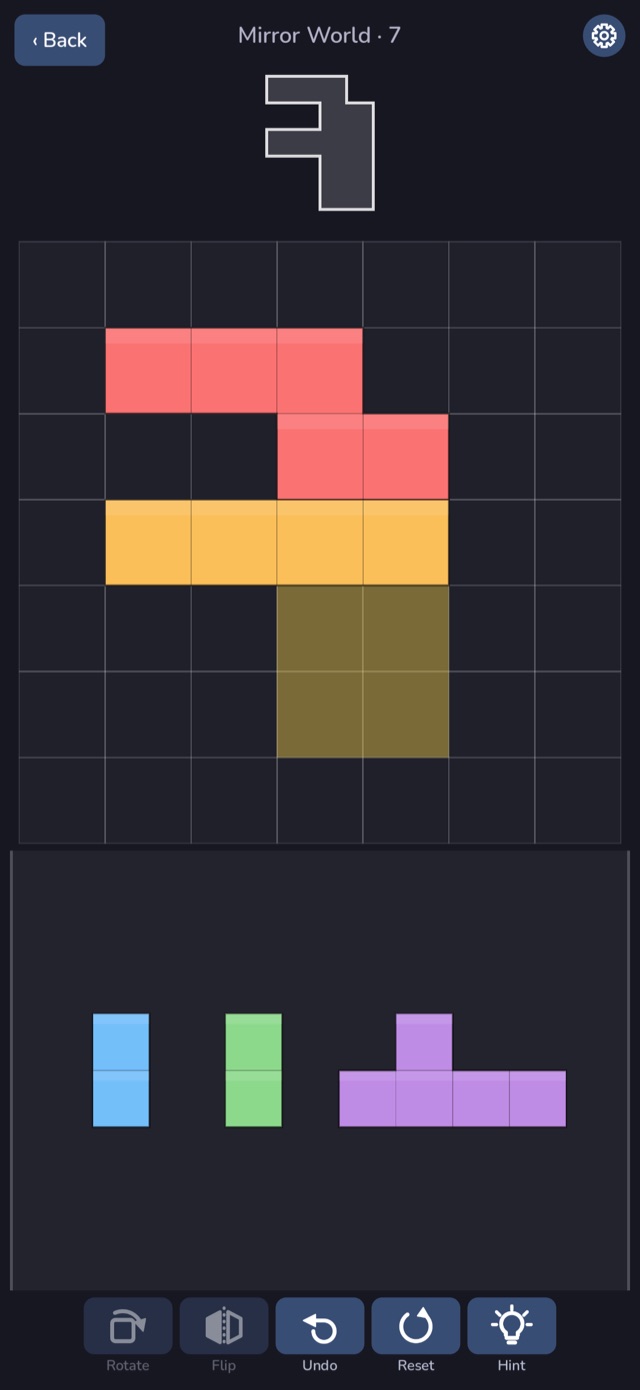 A square-grid puzzle: pieces being fitted into the target shape
